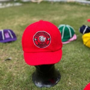 Custom English Baggy Cap with traditional 8-panel design, featuring premium embroidery on the front and a tailored fit for classic cricket style.