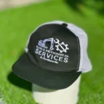 Custom Trucker Hat with mesh back, curved peak, and embroidered front logo – personalised headwear for UK teams and businesses