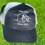 Custom Trucker Hat with mesh back, curved peak, and embroidered front logo – personalised headwear for UK teams and businesses