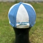 Custom English Baggy Cap with traditional 8-panel design, featuring premium embroidery on the front and a tailored fit for classic cricket style.